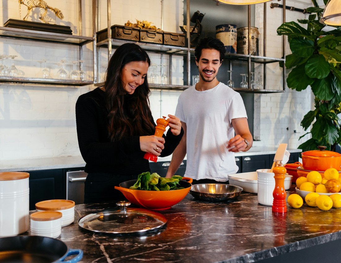 Couple cooking a fresh, healthy meal together
