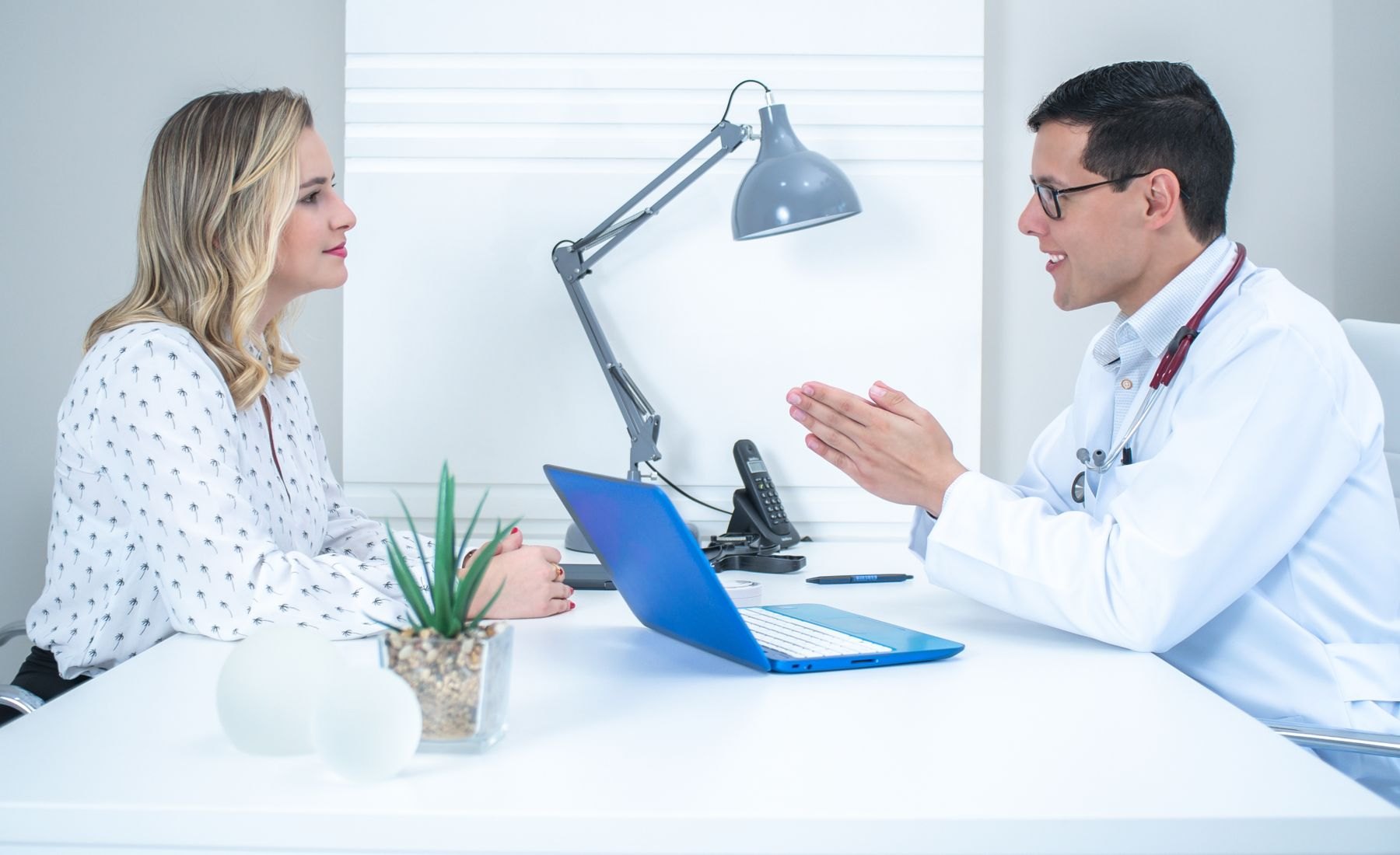 Healthcare provider talking with a patient